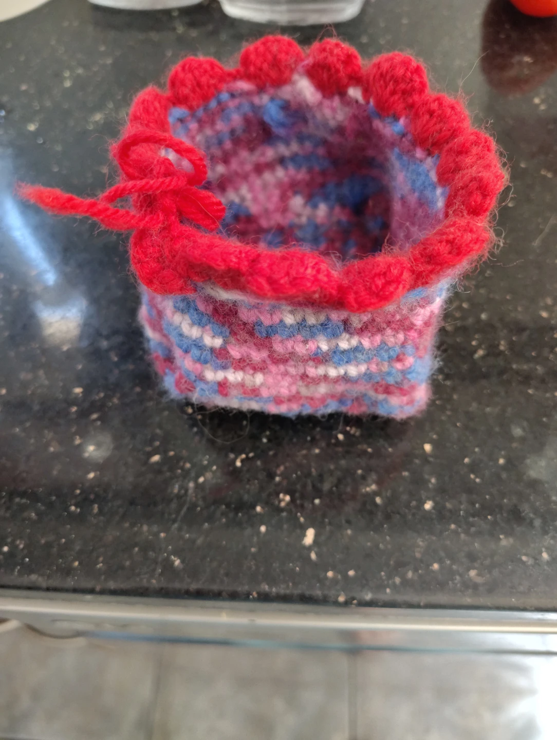 Hand-knitted pot holder cozy