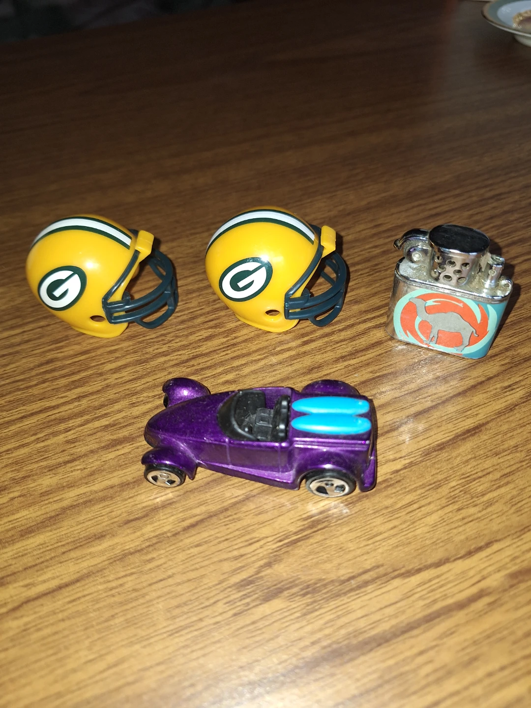 Green Bay Packers Helmets, Lighter, and Toy Car Lot