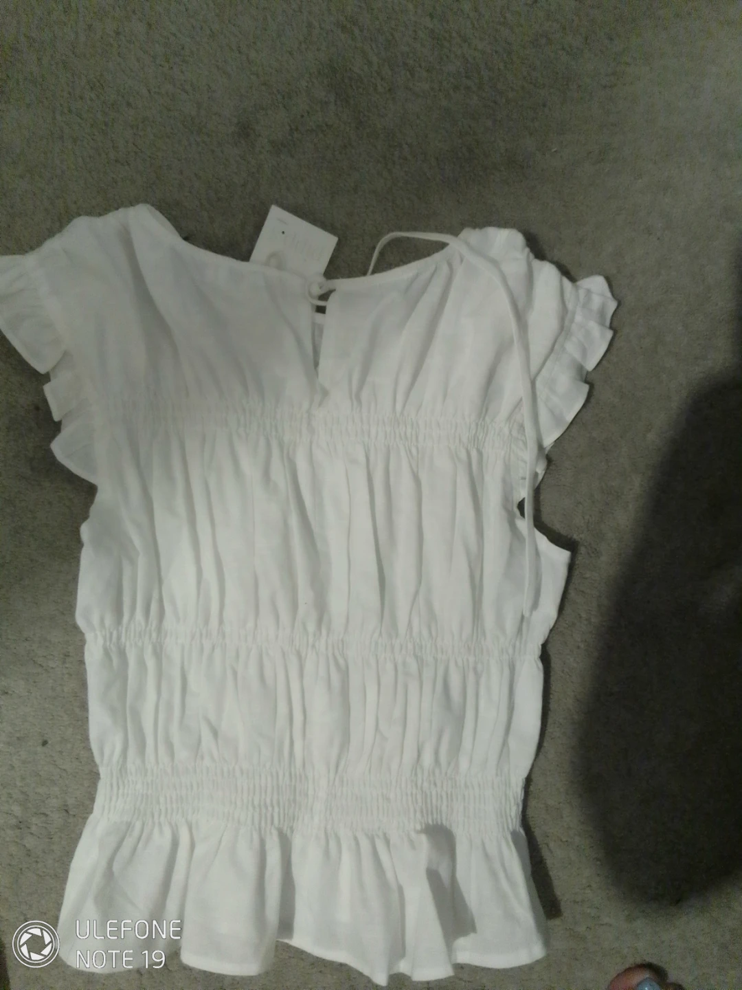 White Smocked Peplum Top