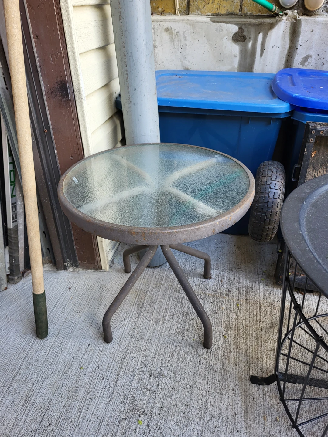 Glass top patio side table
