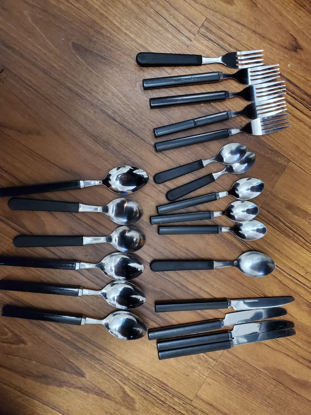 Set of Stainless Steel Cutlery with Black Handles