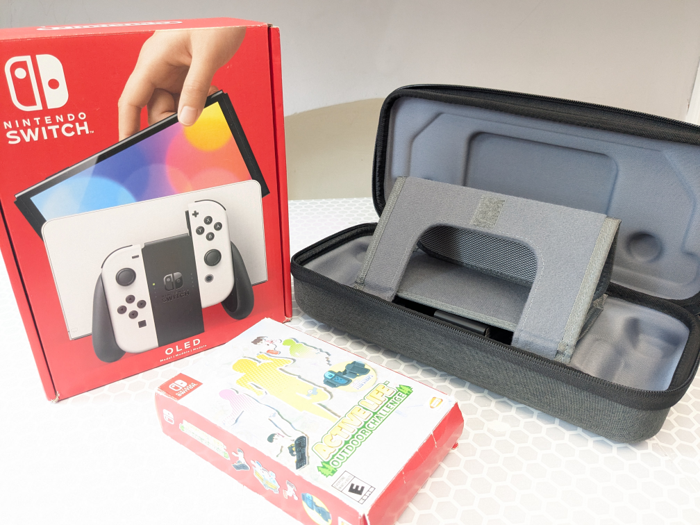 Nintendo Switch OLED System + Active Life Game