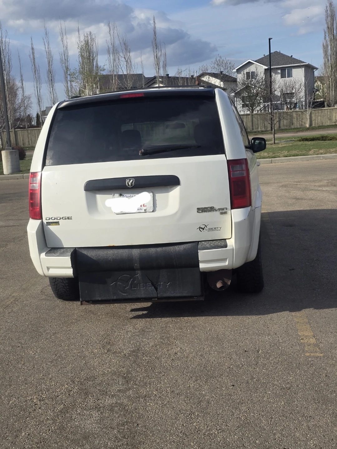 White Dodge Grand Caravan