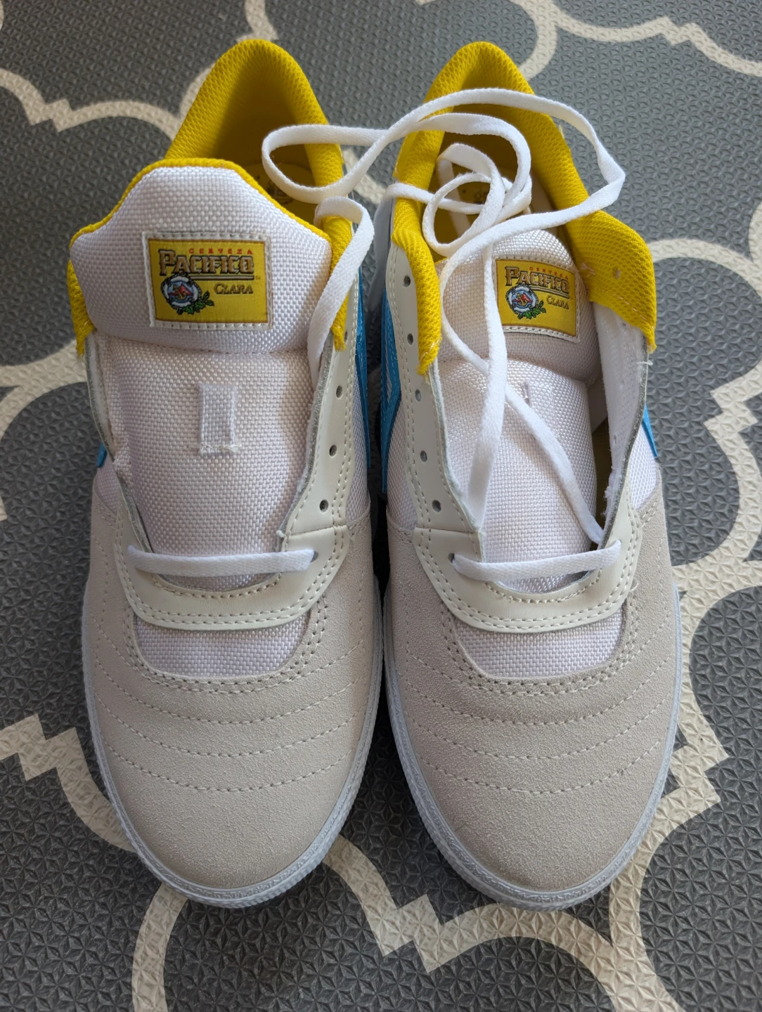 Lakai x Pacifico Cambridge white and cyan suede skate shoes.