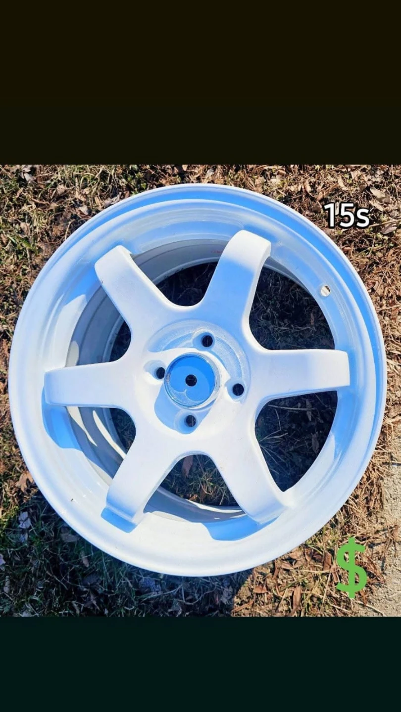 New 15 inch rims wheels 4x100 w. Vogue tires