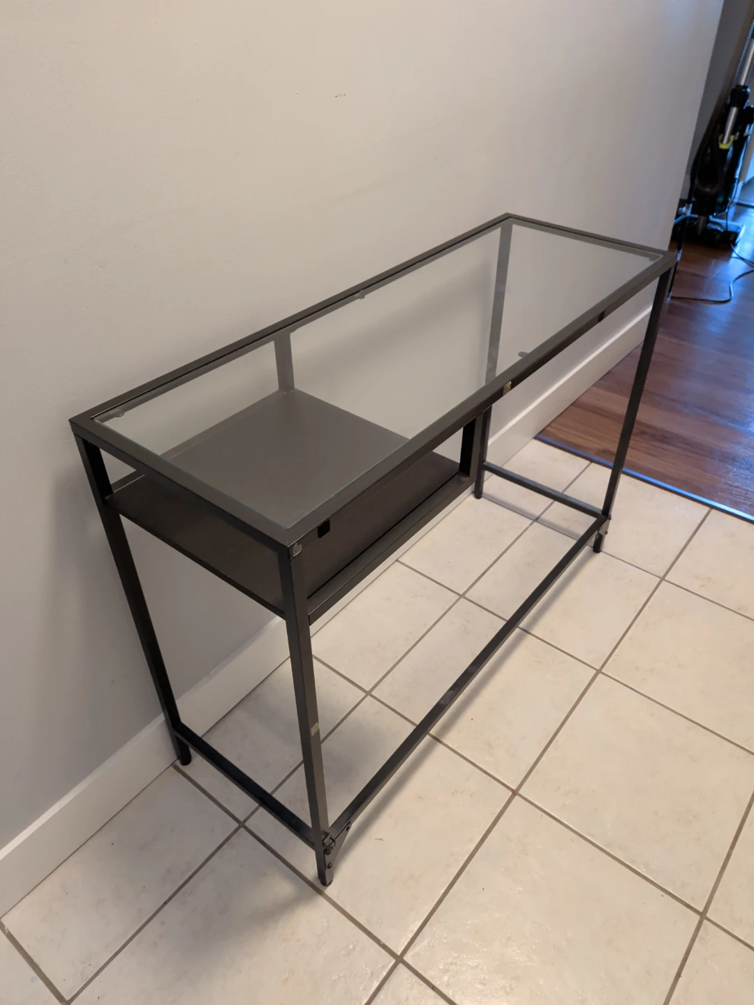 Glass Top Console Table with Black Metal Frame
