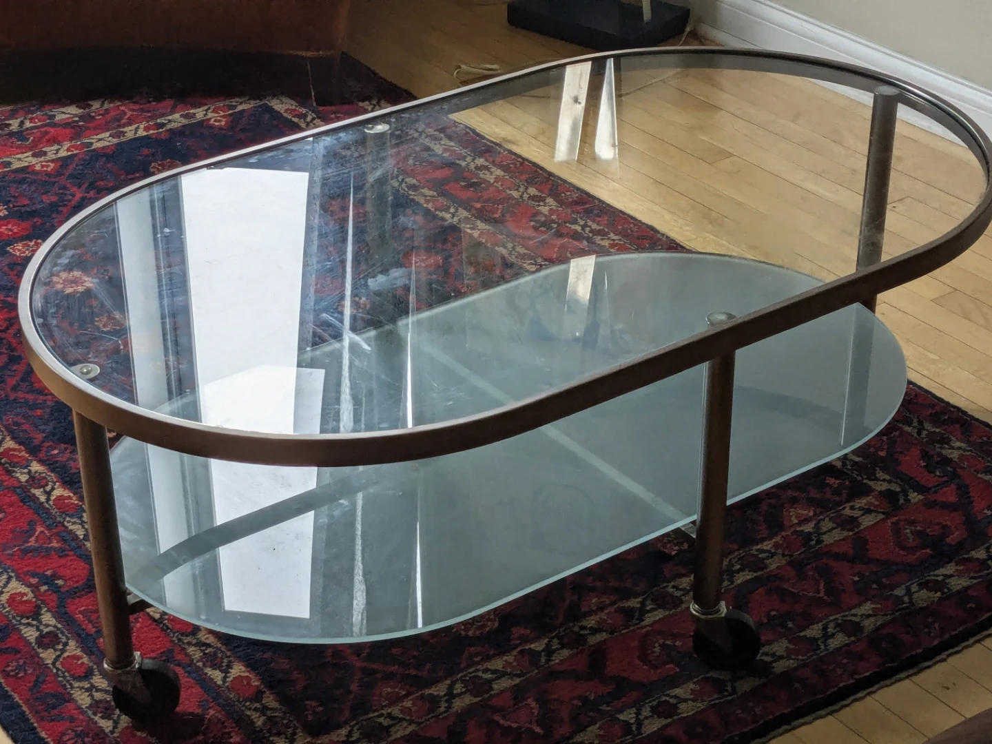 Oval Glass Top Coffee Table with Wheels - photo 2