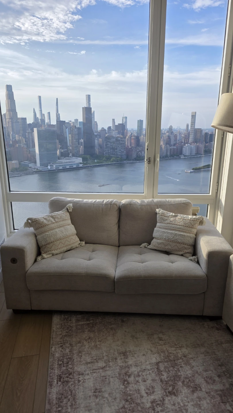 Light Beige Sectional Sofa with Decorative Pillows