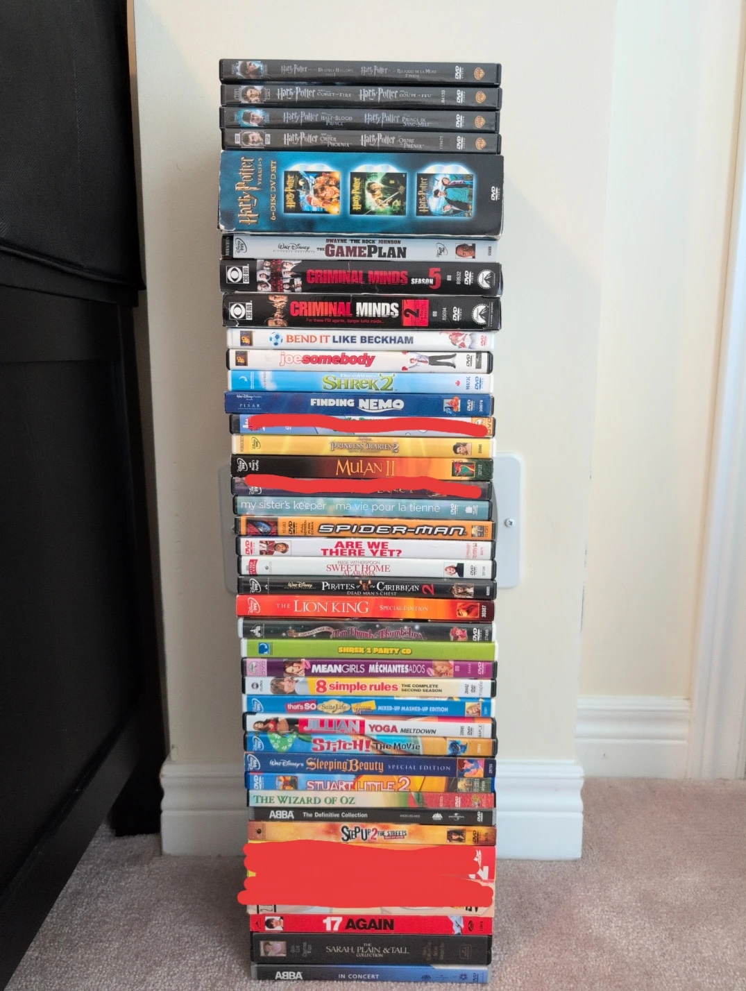 Assorted DVDs and VHS Tapes for sale