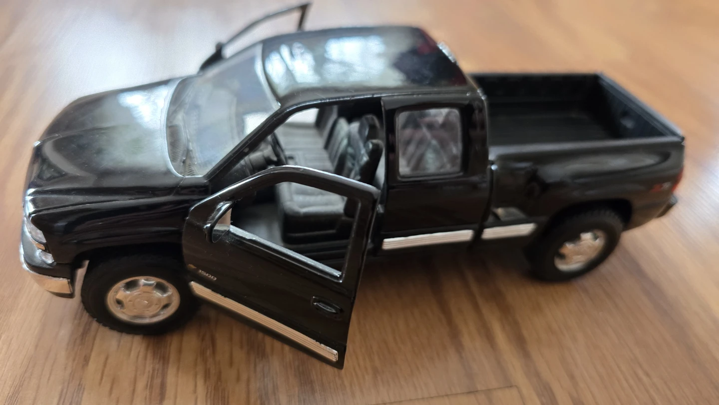Black Diecast Chevrolet Silverado Pickup Truck 1500