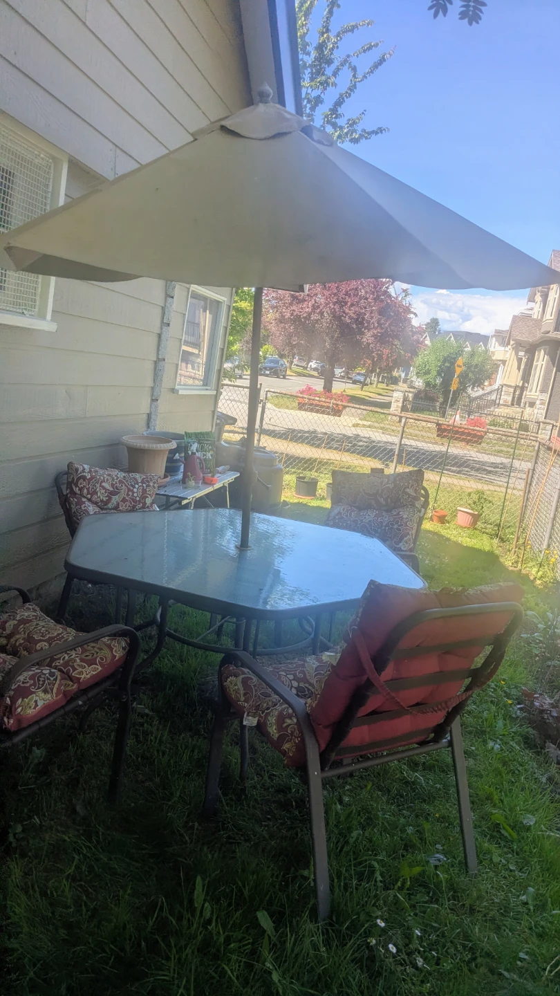Outdoor patio table and chairs set with umbrella