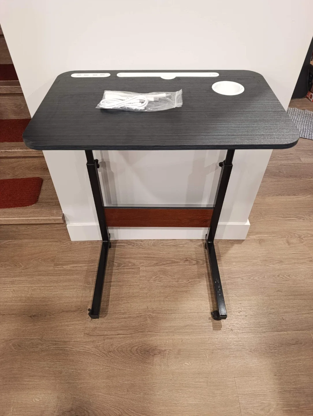 Overbed table with castors, usb ports and cup holder