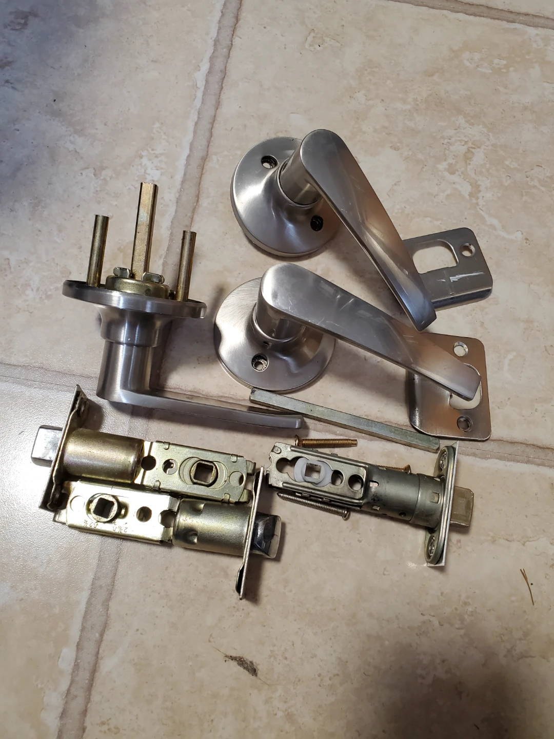 Brushed nickel. Door handle and closet handle
