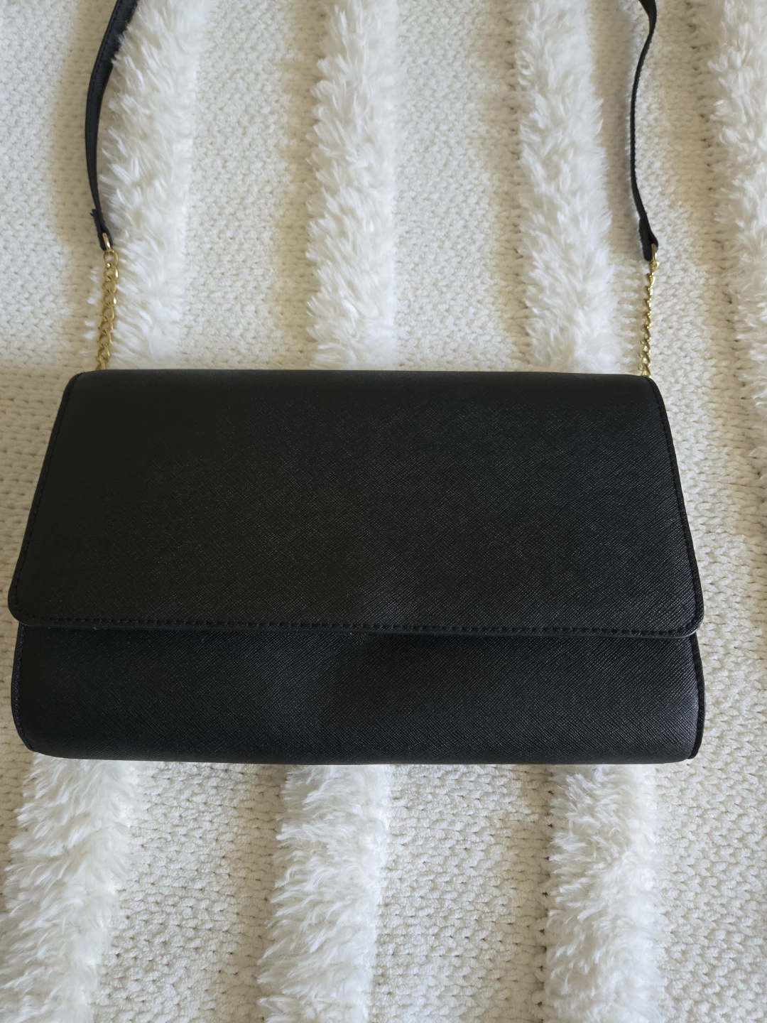 Black H&M clutch with partial chain strap