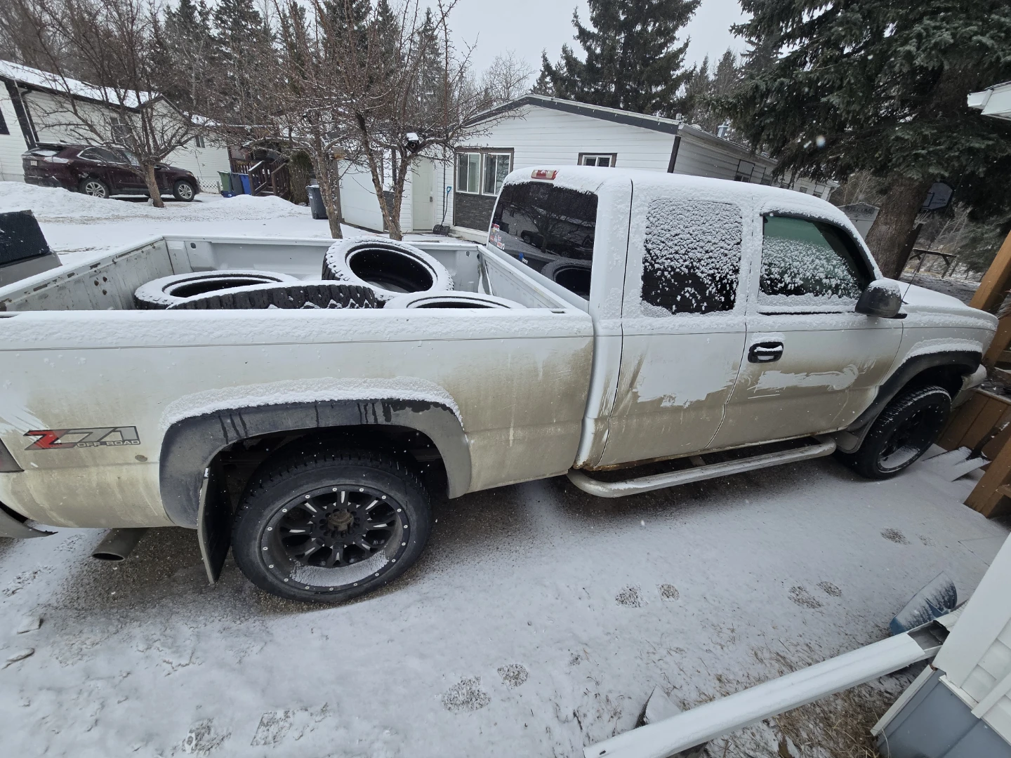 White 4x4 chevy Silverado 1500