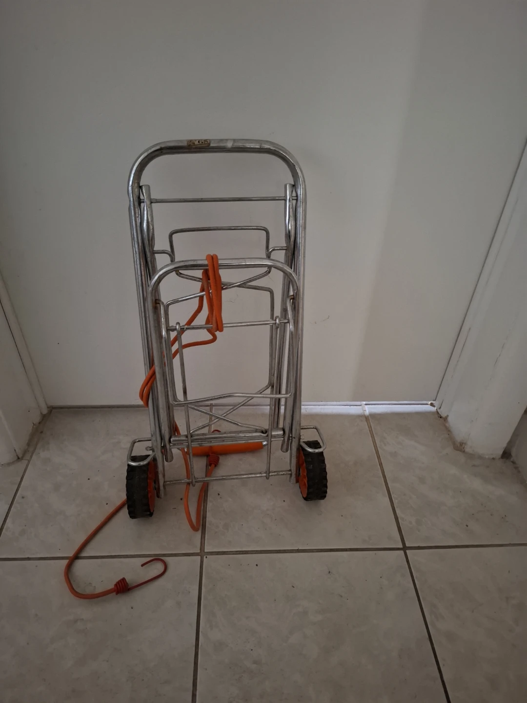 Folding Cart with Orange Handles and Bungee Cord