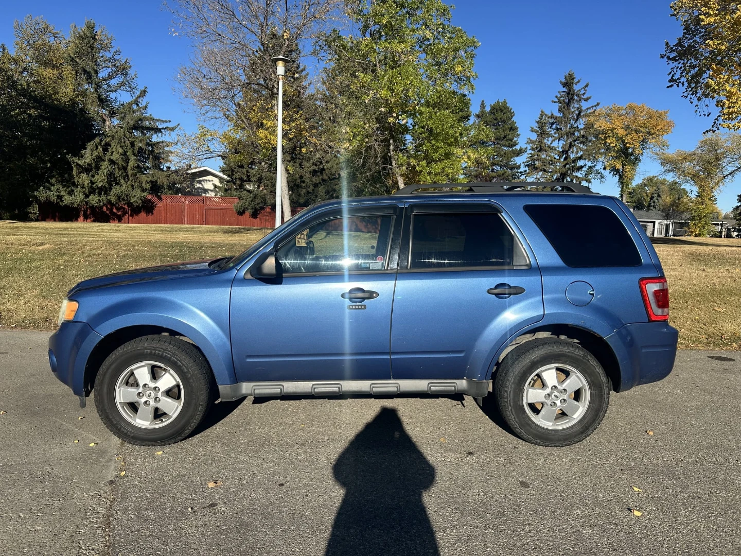 Blue Ford Escape SUV - photo 2