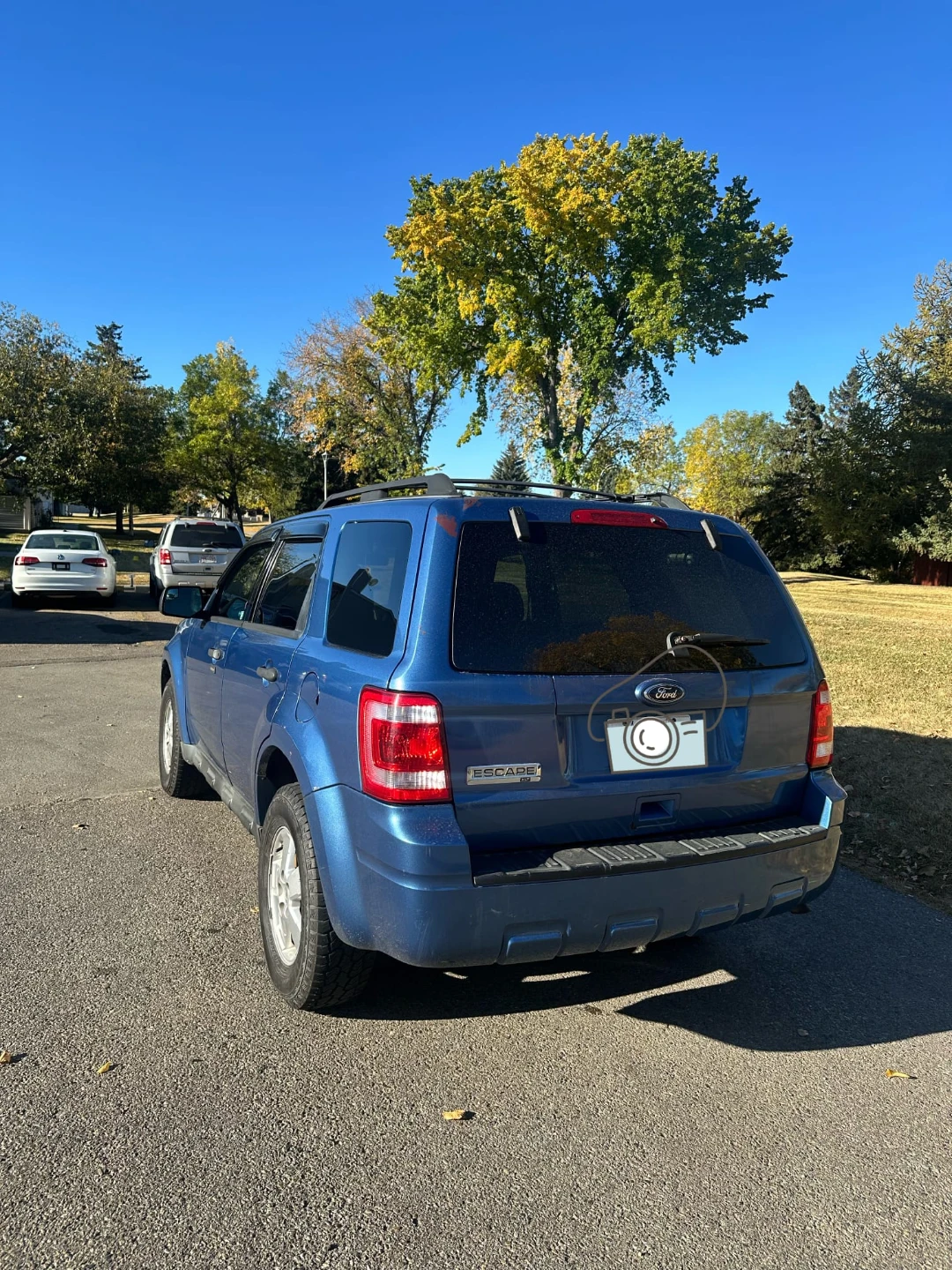 Blue Ford Escape SUV - photo 3
