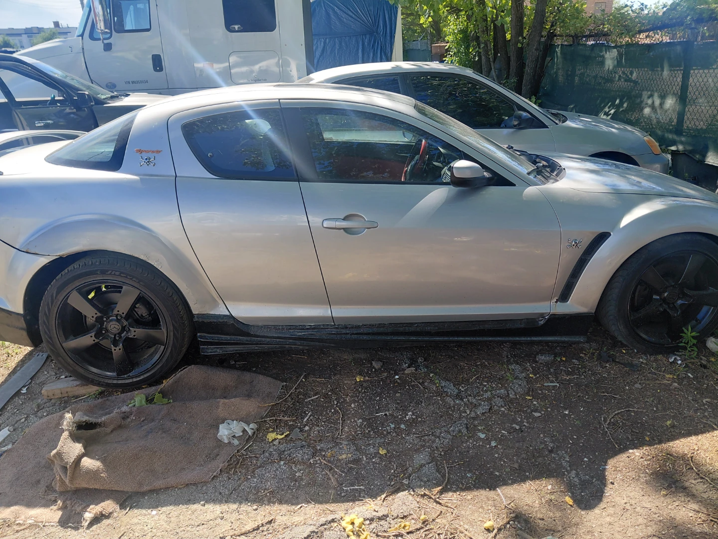 Mazda RX-8 Silver 4-Door Sports Car