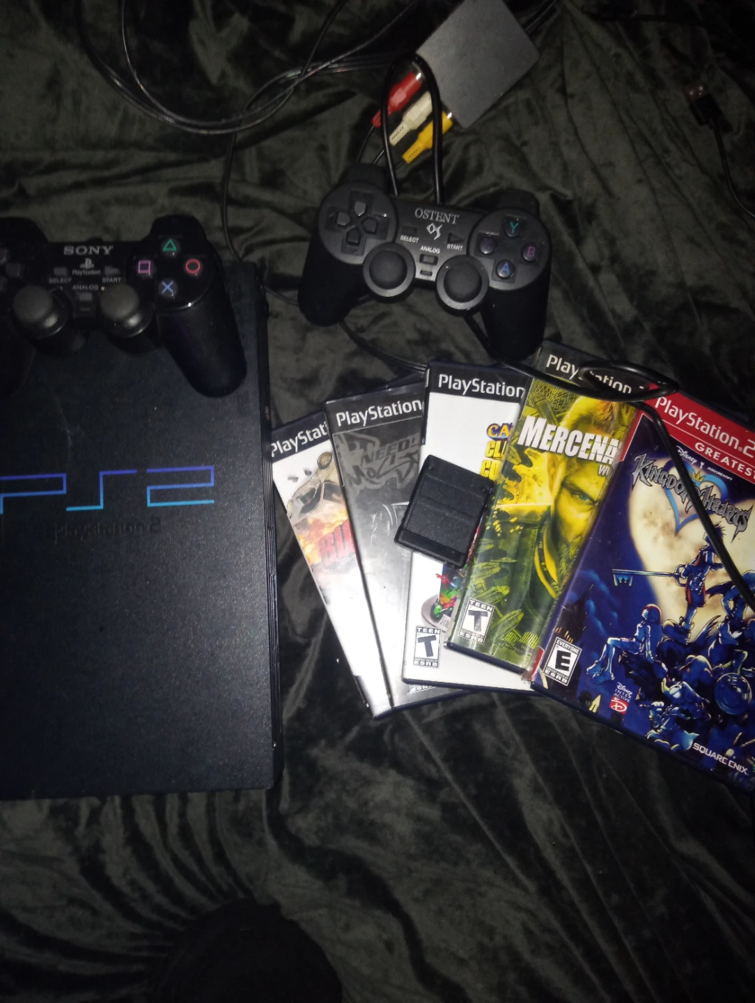 PlayStation 2 Console with Games and Controllers