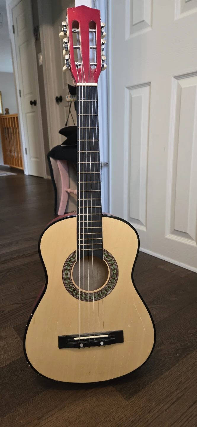 Red and Tan Small Acoustic Guitar