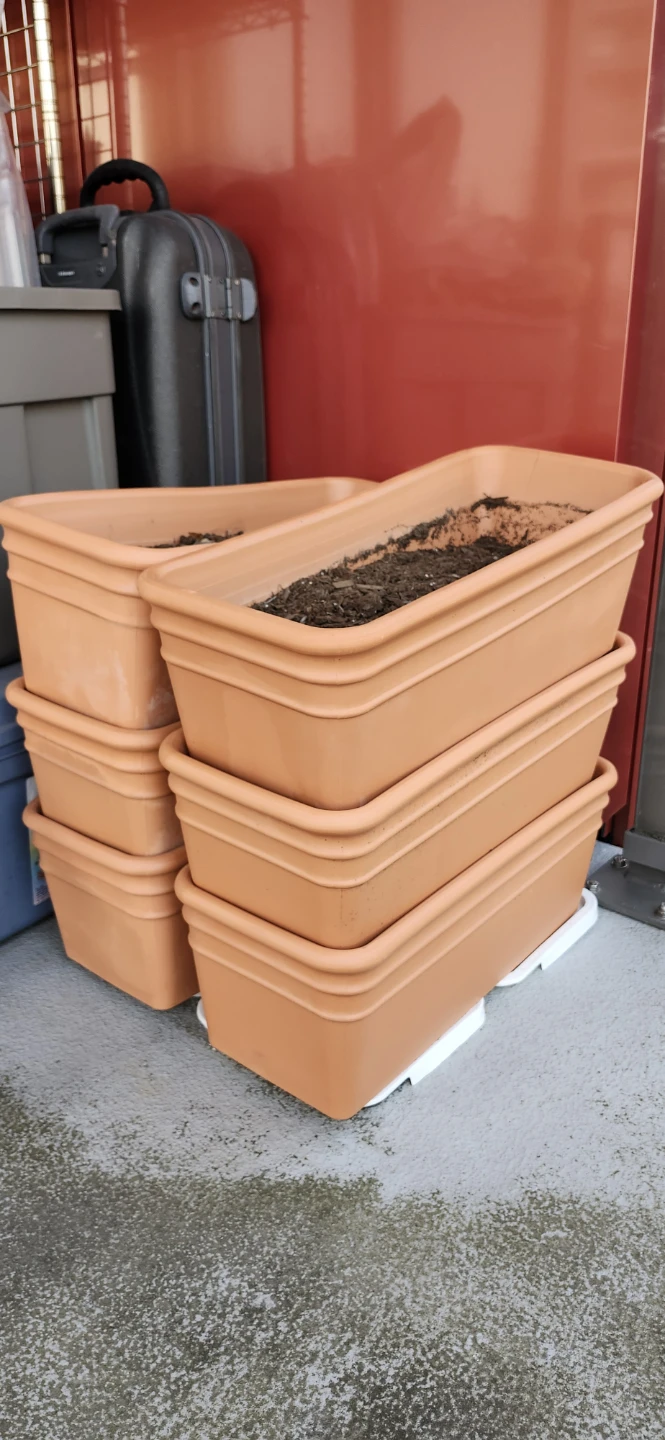 Terracotta coloured planters - set of 6