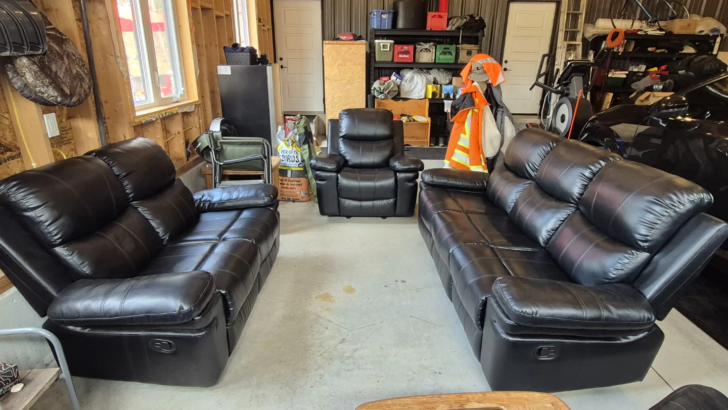 Black Faux Leather Reclining Sofa and Loveseat Set