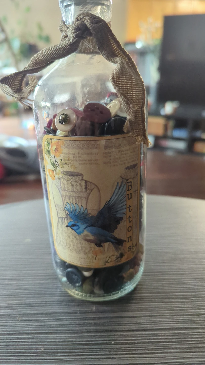 Decorative Glass Bottle with Buttons and Bird Design