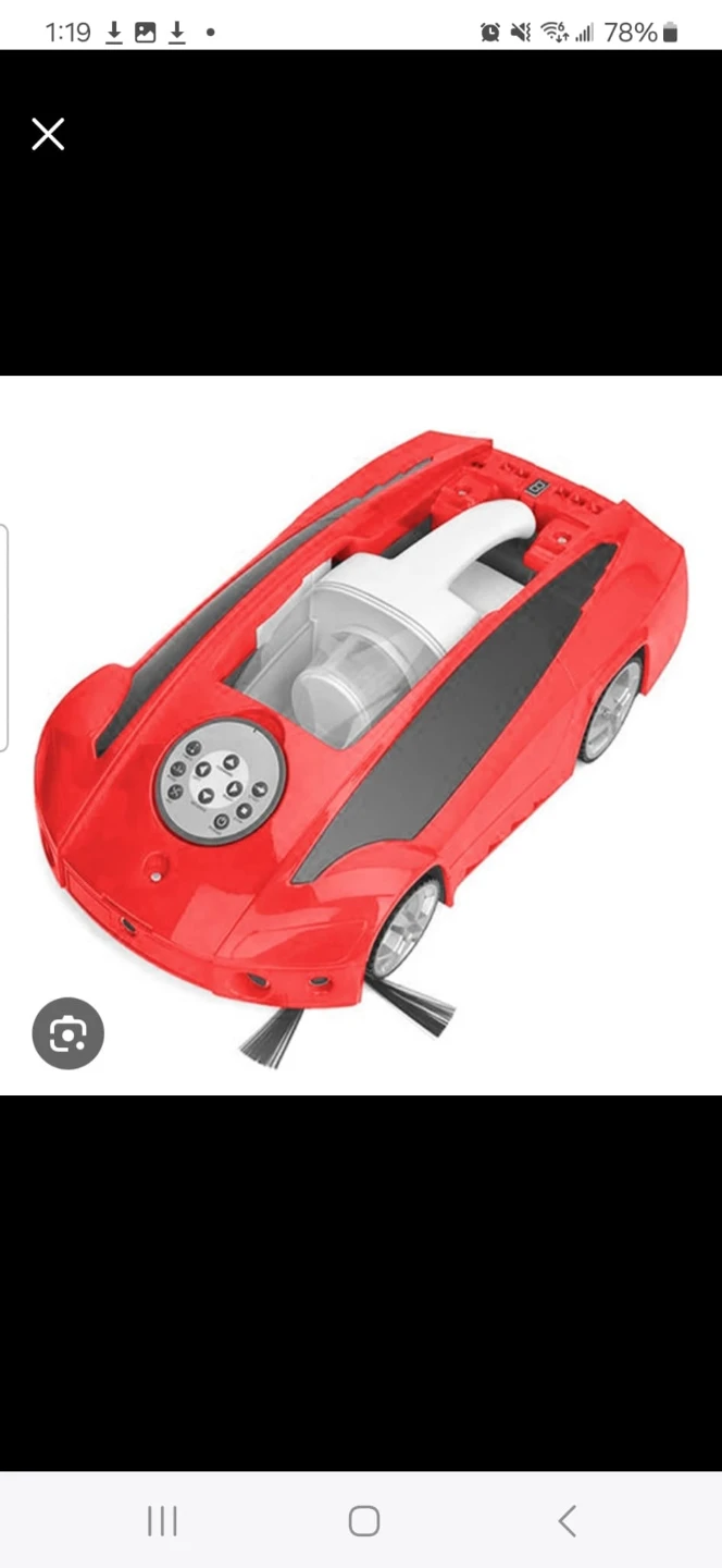 Red Toy Vacuum Cleaner in Car Design