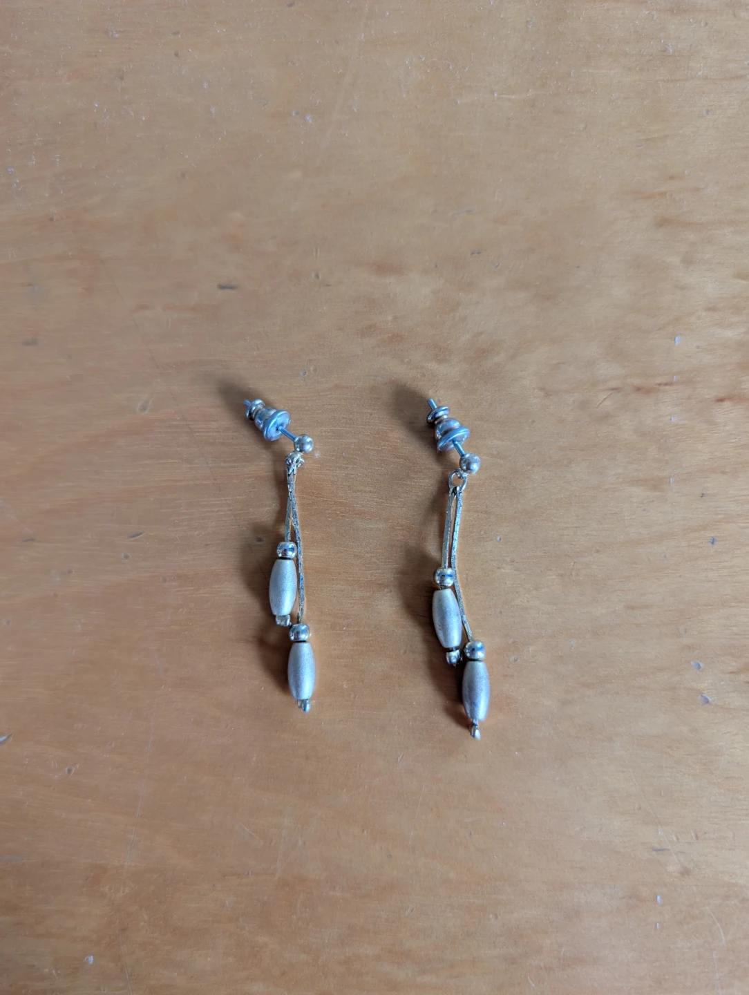 Dangly gold tone beaded earrings