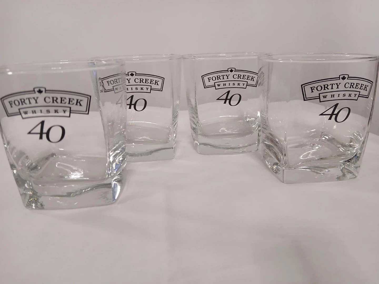 Set of 4 Forty Creek Whisky Glasses . Pick up only.