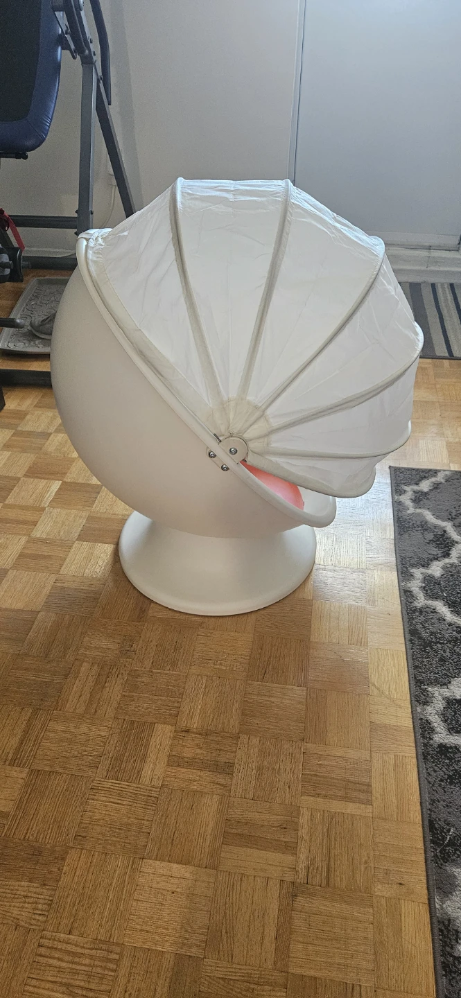 White Pod Chair with Orange Seat Cushion