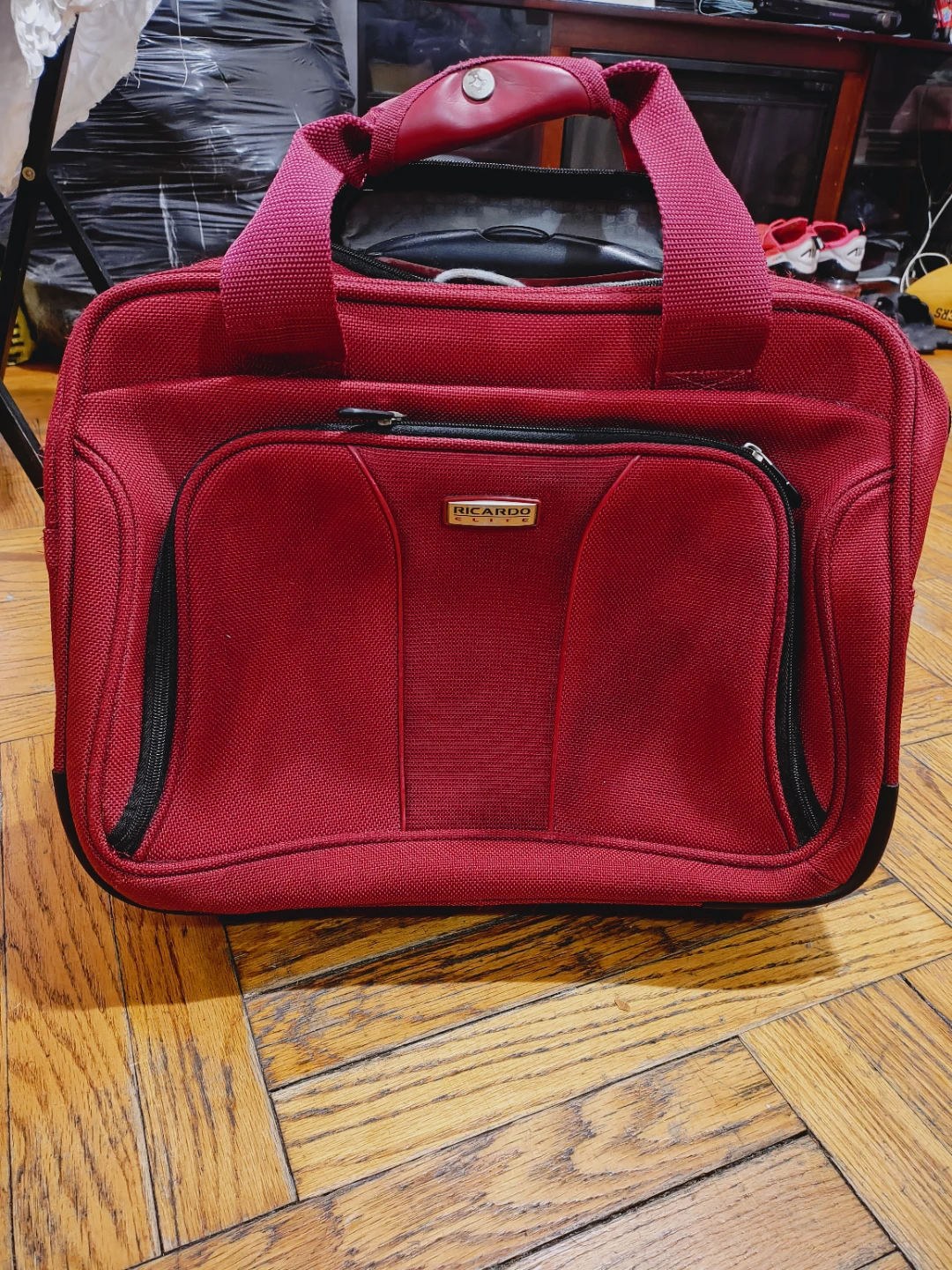 Ricardo Red Rolling All purpose multi compartment bag used