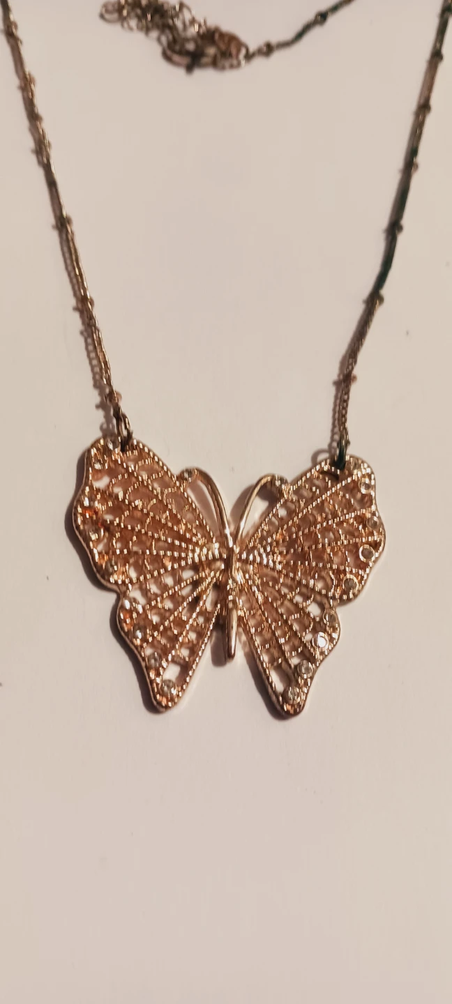 Silver tone butterfly filigree pendant with necklace