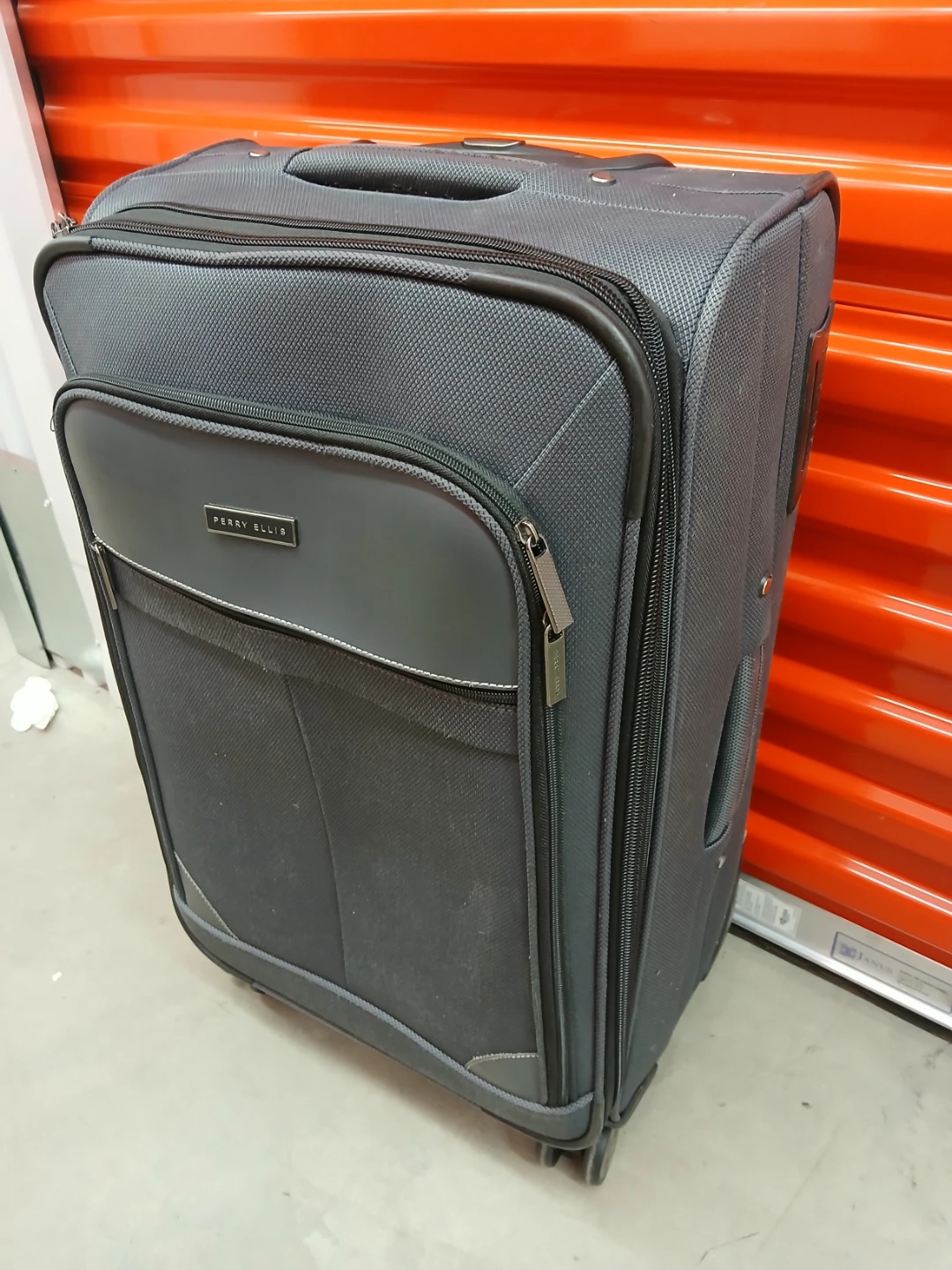 Perry Ellis Rolling Suitcase 27" high
