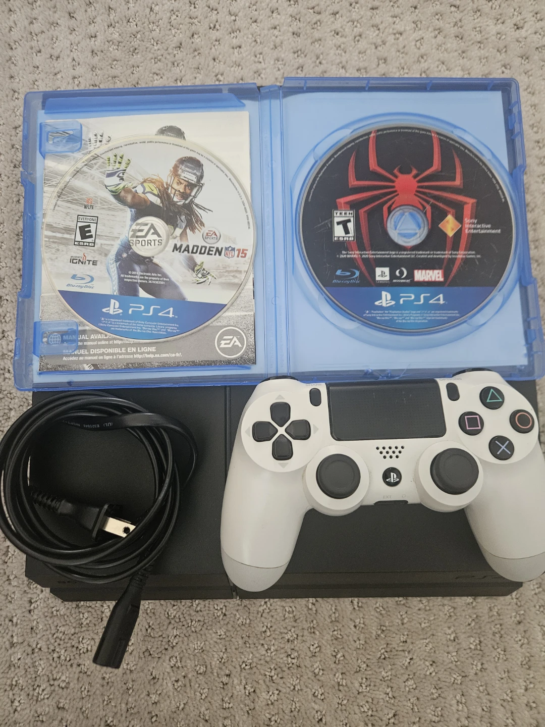 PlayStation 4 Console with Madden 15 and Spider-Man Games