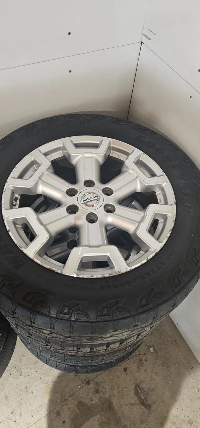 Nissan Wheels and Goodyear Wrangler Tires LT265/60R20