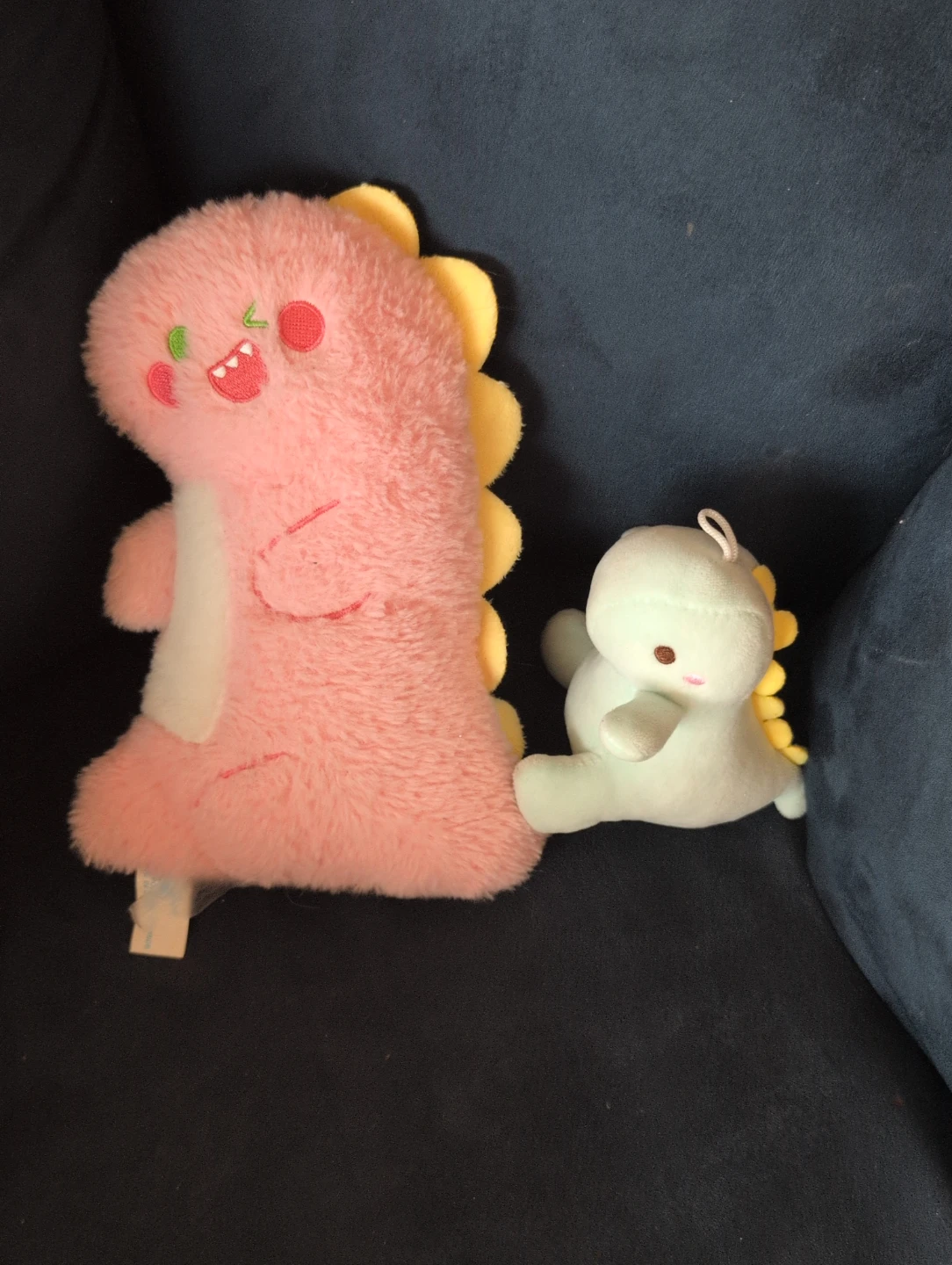 Pink and Teal Dinosaur Plushies