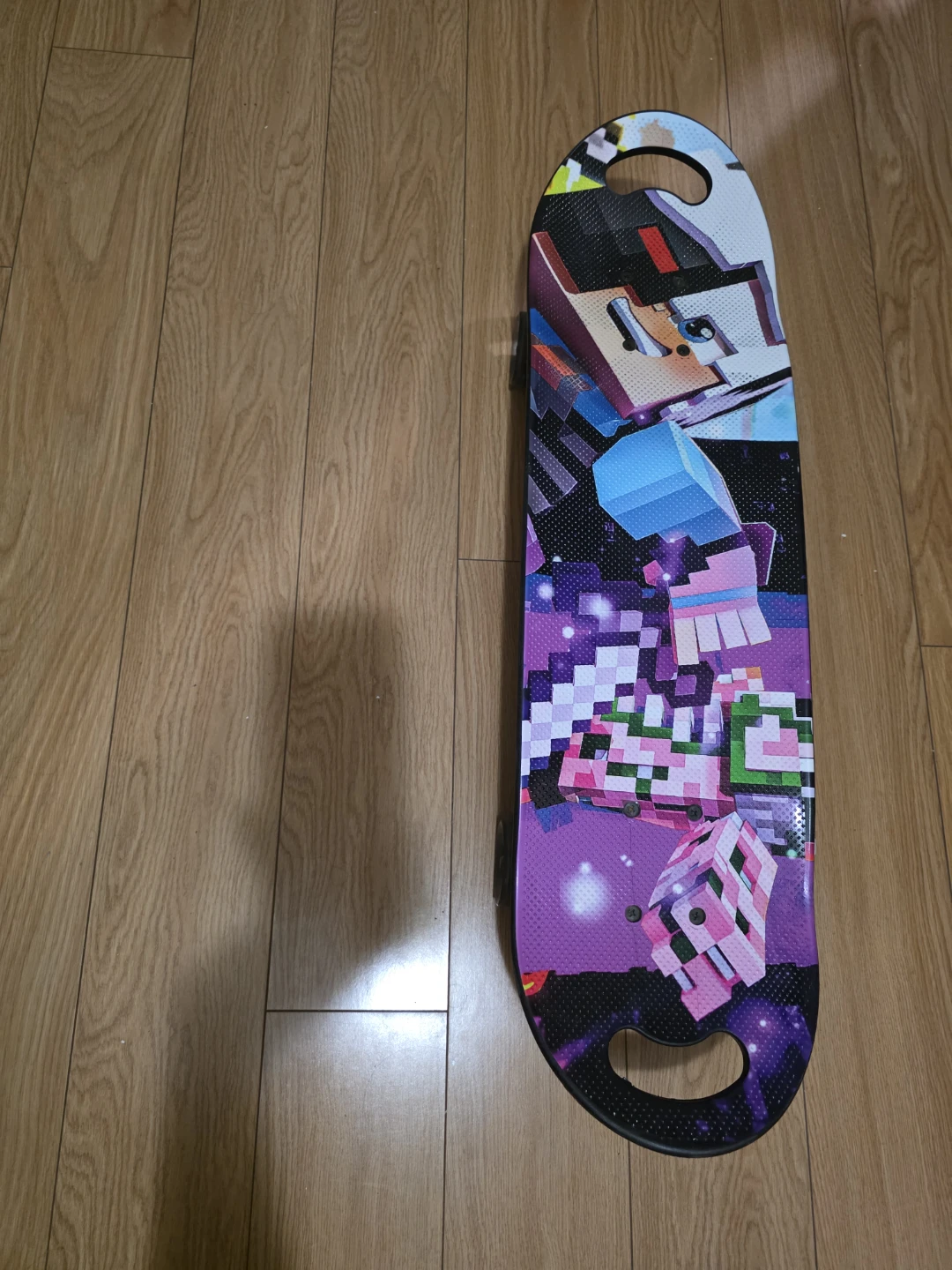 Pixel Art Skateboard with Light-Up Wheels