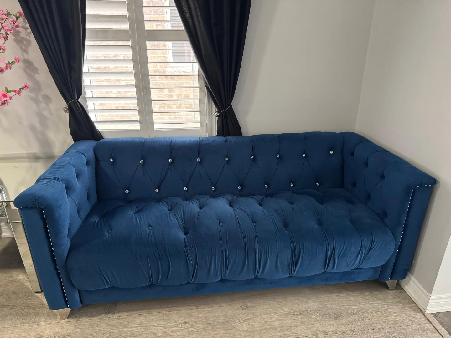 Blue Velvet Tufted Sofa with Crystal Accents