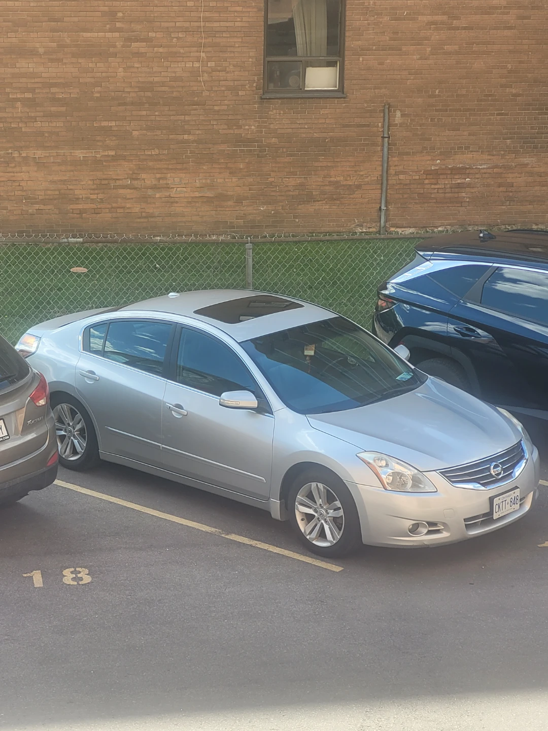 Silver Nissan Altima Sedan