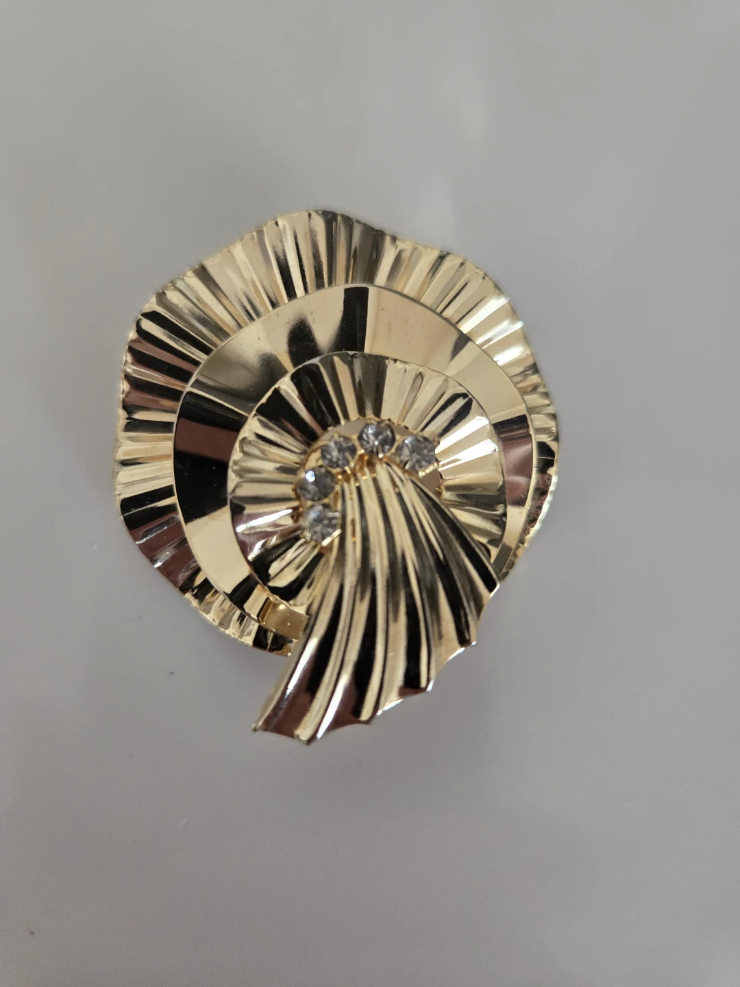 Gold-tone Spiral Scarf Clip with small rhinestones