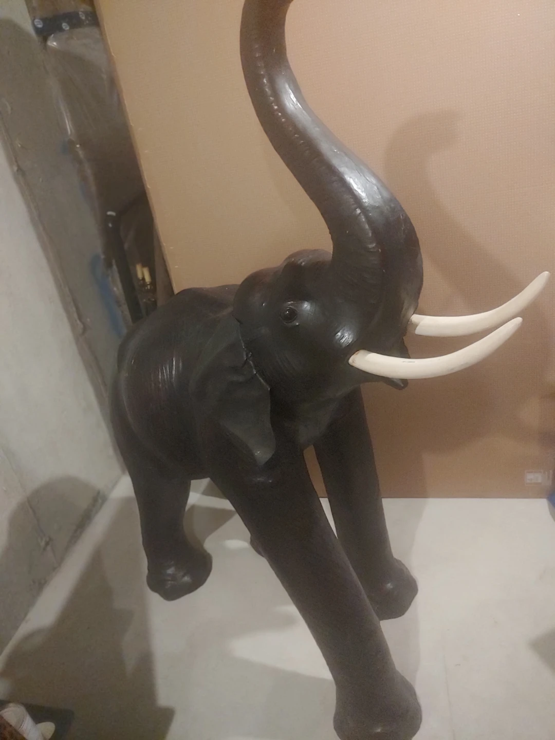 5ft tall leather antique elephant a four thousand dollar value.
