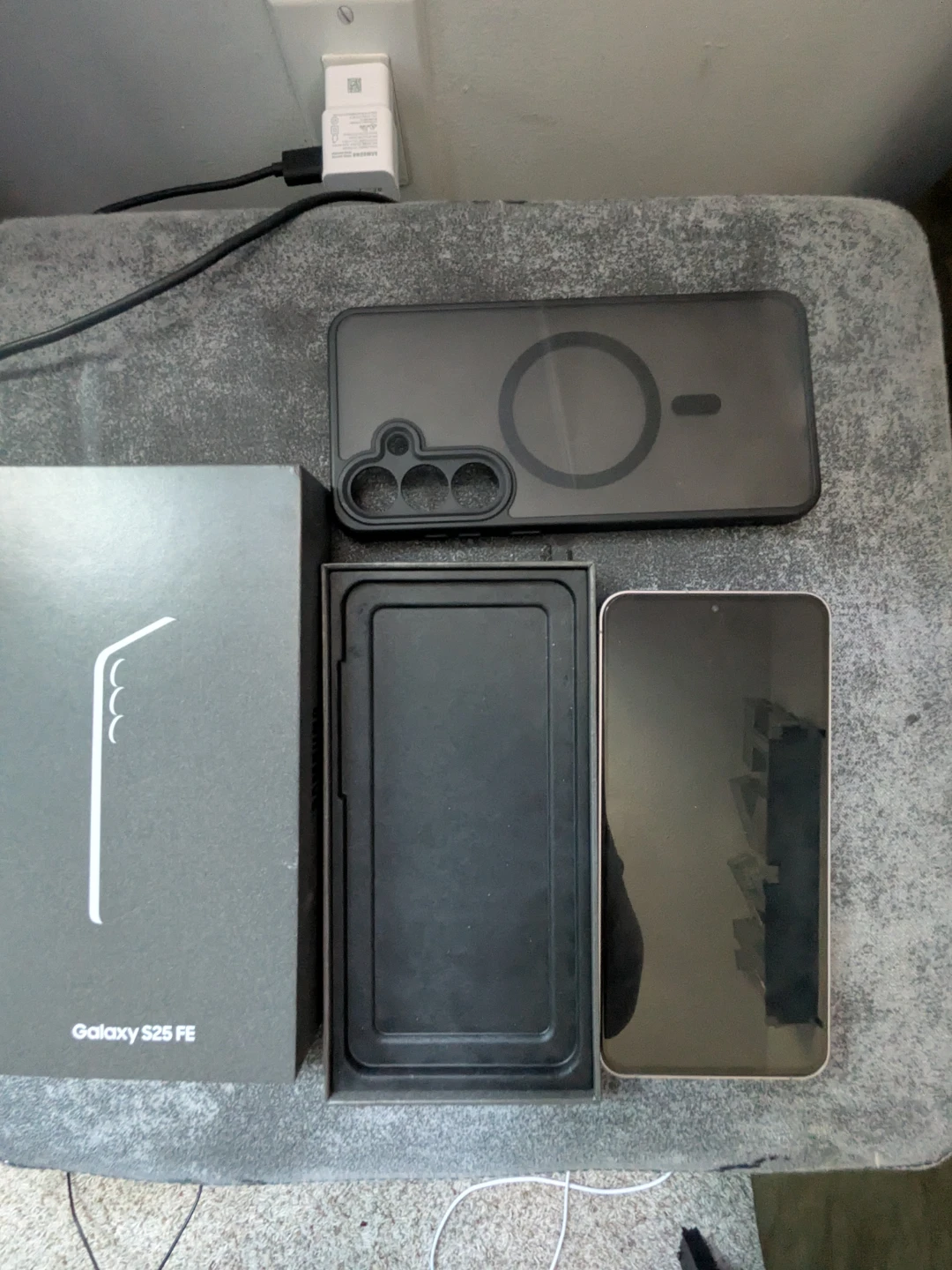 Samsung Galaxy S25 FE with a case and screen protector