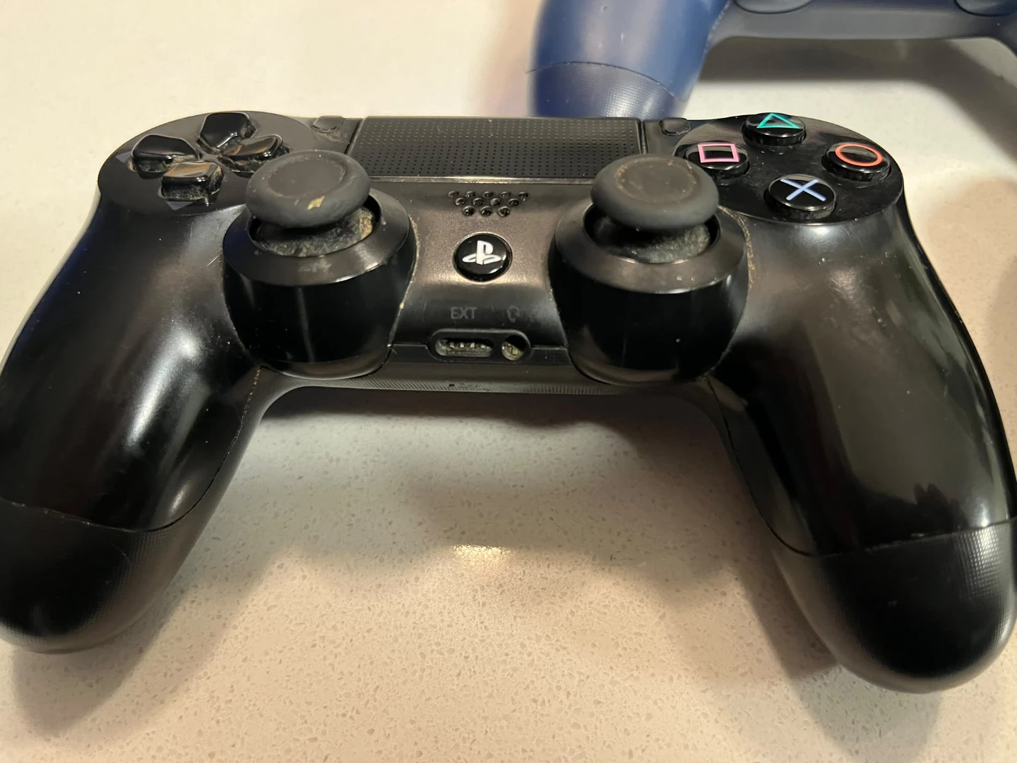 Pair of  Black Sony PlayStation 4, DualShock 4 Controllers