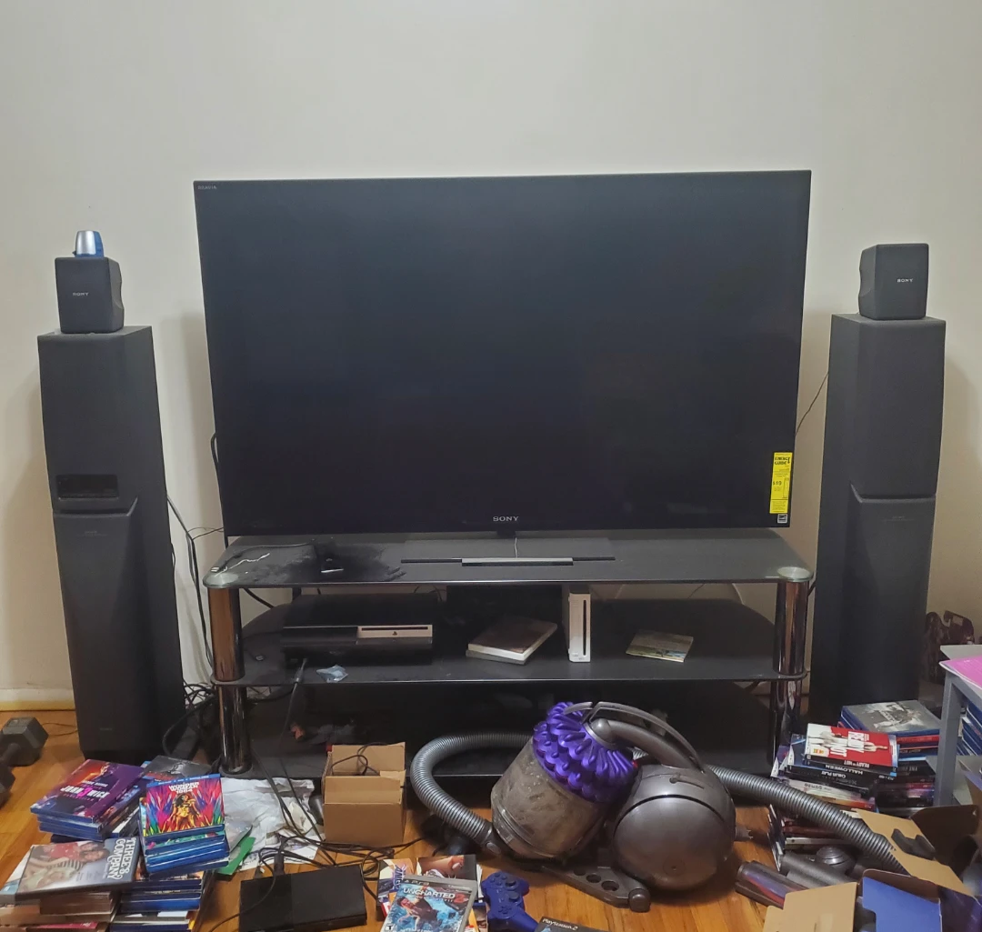 55" TV with 2 Tower speakers and a TV Sand,  On sale for $850