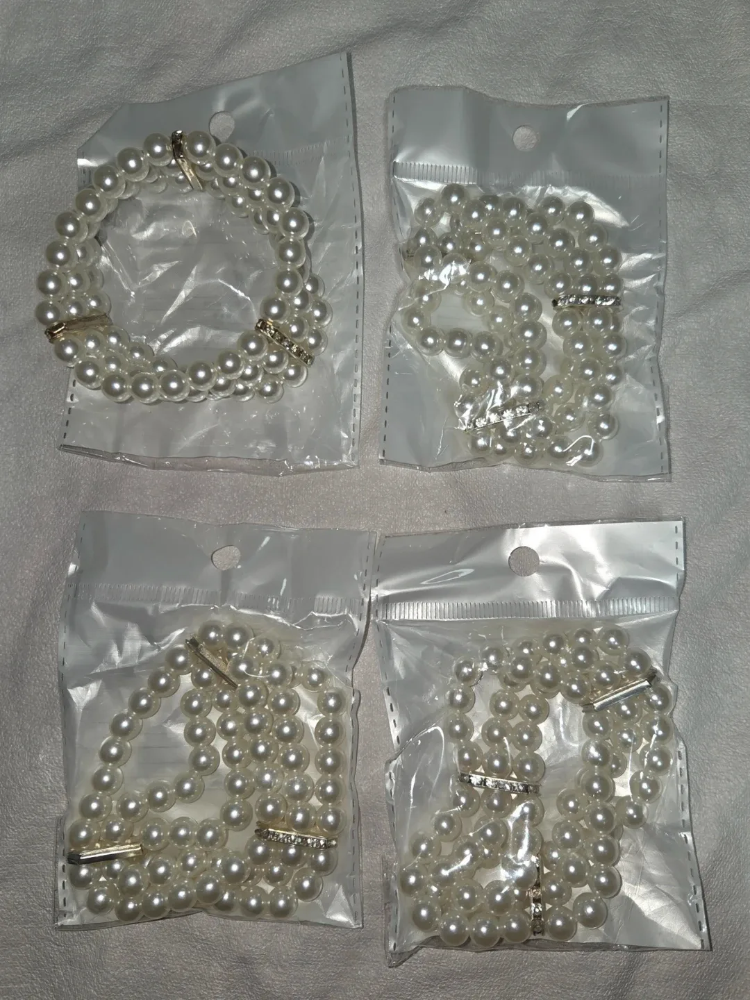 Set of 4 Faux Pearl Bracelets with Rhinestones