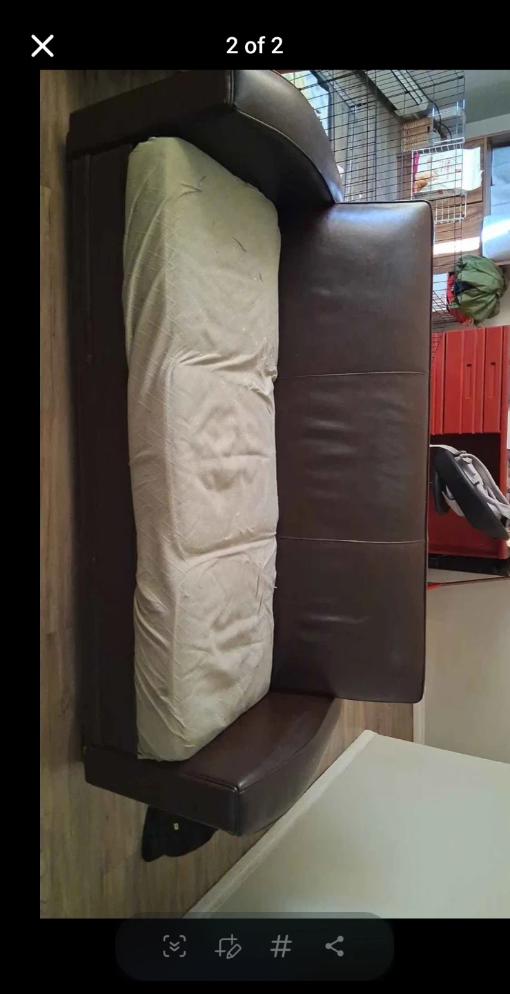 Brown Faux Leather Sofa.