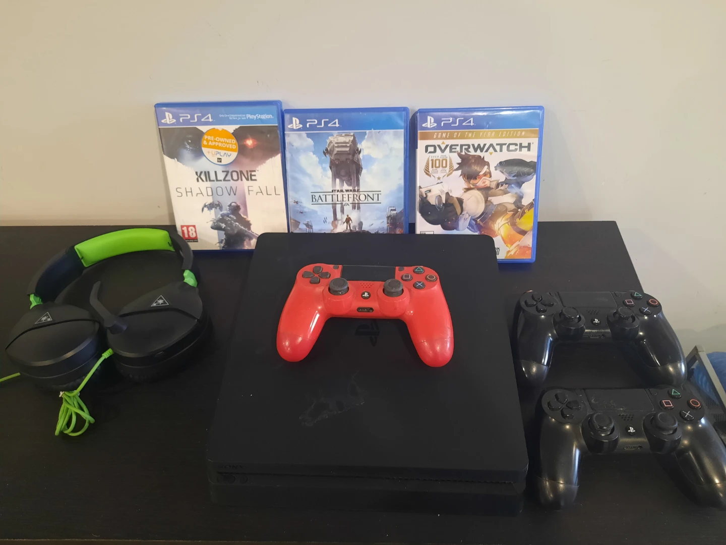 PlayStation 4 Console with 3 Games and 3 Controllers
