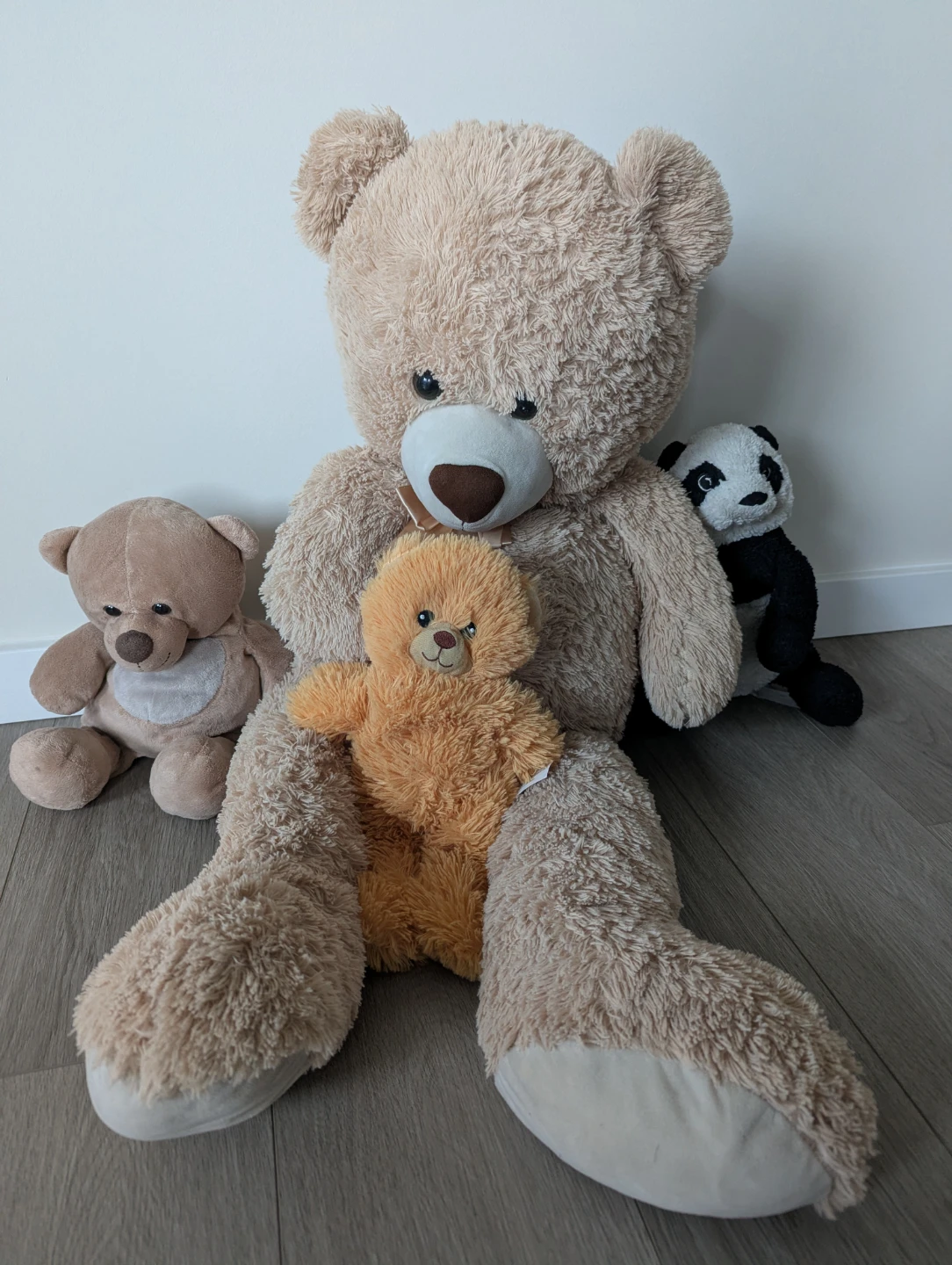 Collection of Four Plush Teddy Bears and a Panda